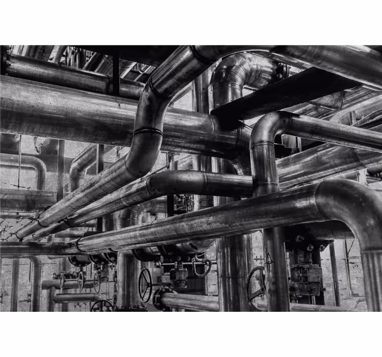 Industriell betongvegg med rør fototapet moderne - Tenstickers