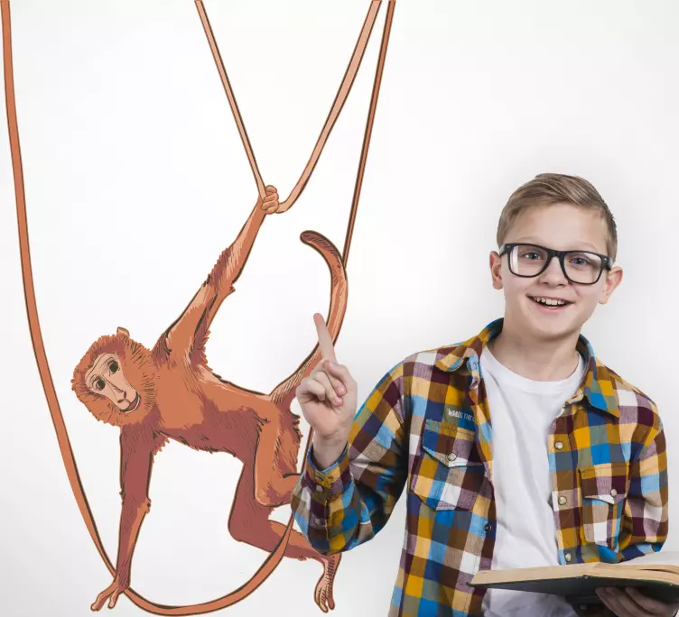 Baby ape svinger på en plante klistremerker villdyr - Tenstickers