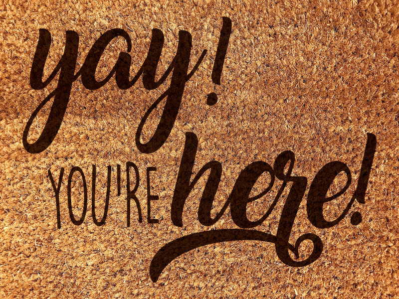 Varm velkomstfrase vinyl teppe mottak - Tenstickers